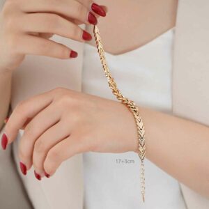 دستبند زنانه ژوپینگ مدل کارتیر و فلش طلایی
